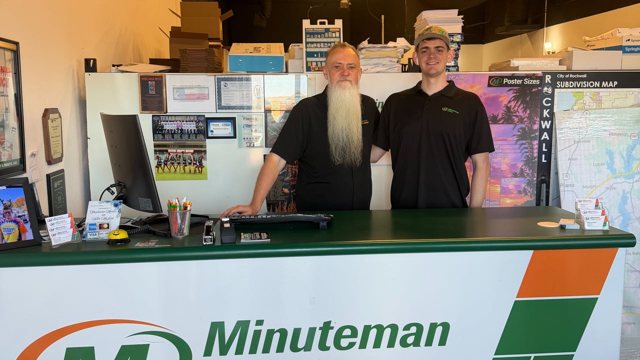 Frank McLeod and his son Tyler at their Minuteman Press franchise in Rockwall, Texas.