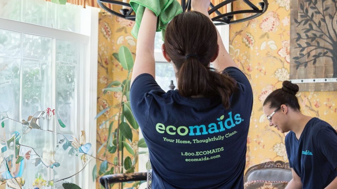 Photo of ecomaids team members cleaning a home