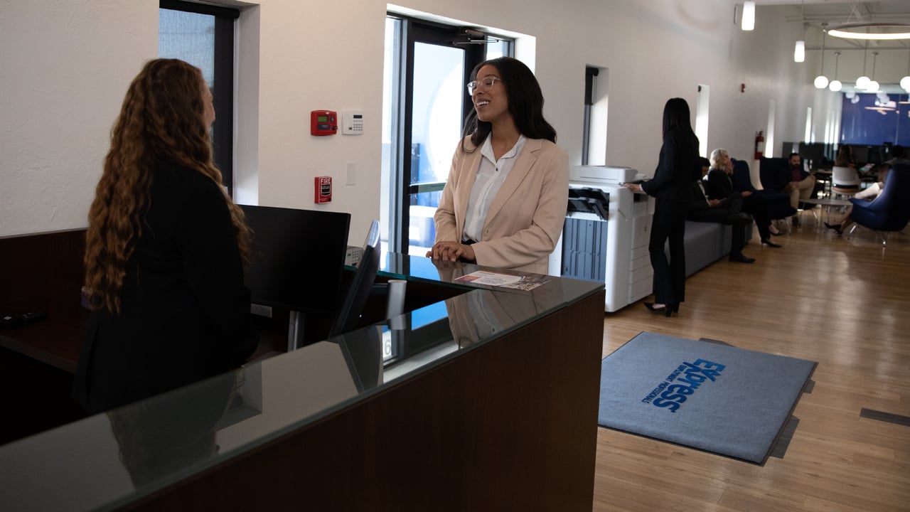 Express Employment Professionals franchise, people talking in a lobby