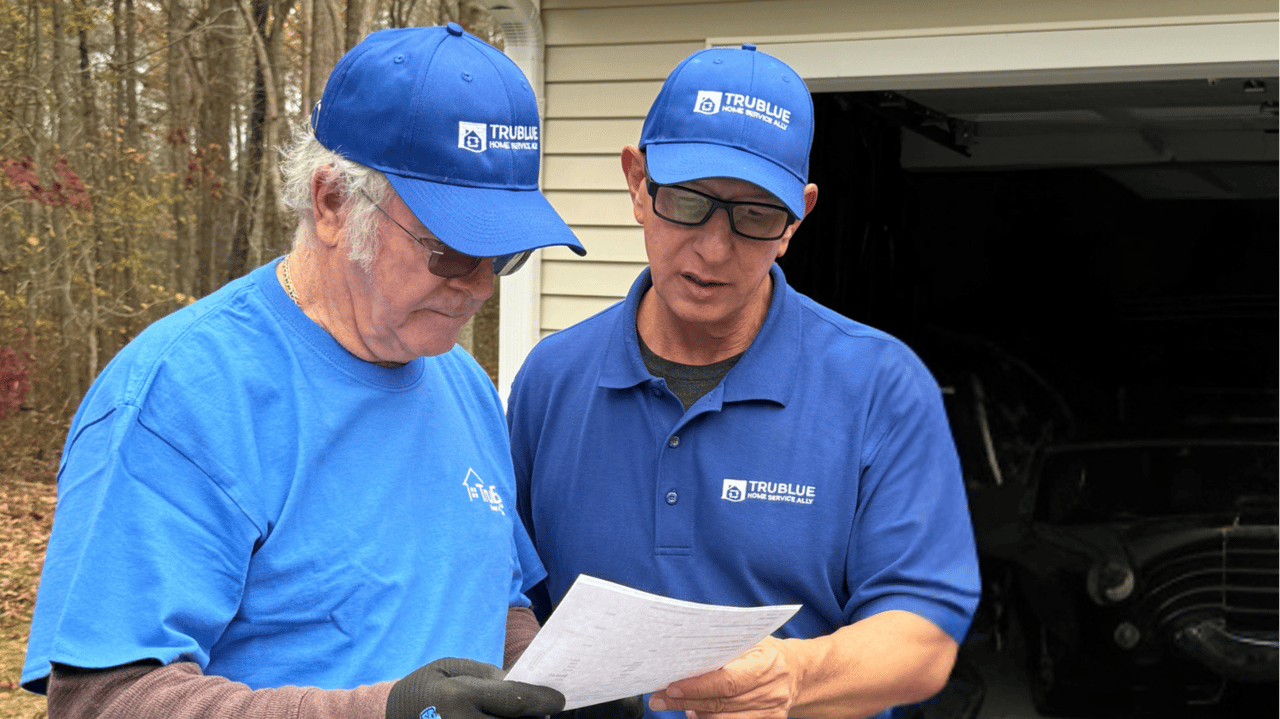 Retired But Not Done? Why TruBlue Is a Perfect Fit Photo of two TruBlue Home Service Ally team members looking at paper