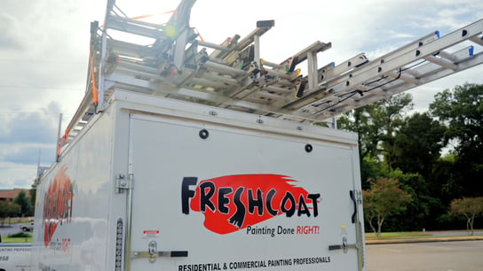 Photo of Fresh Coat vehicle with ladders on top