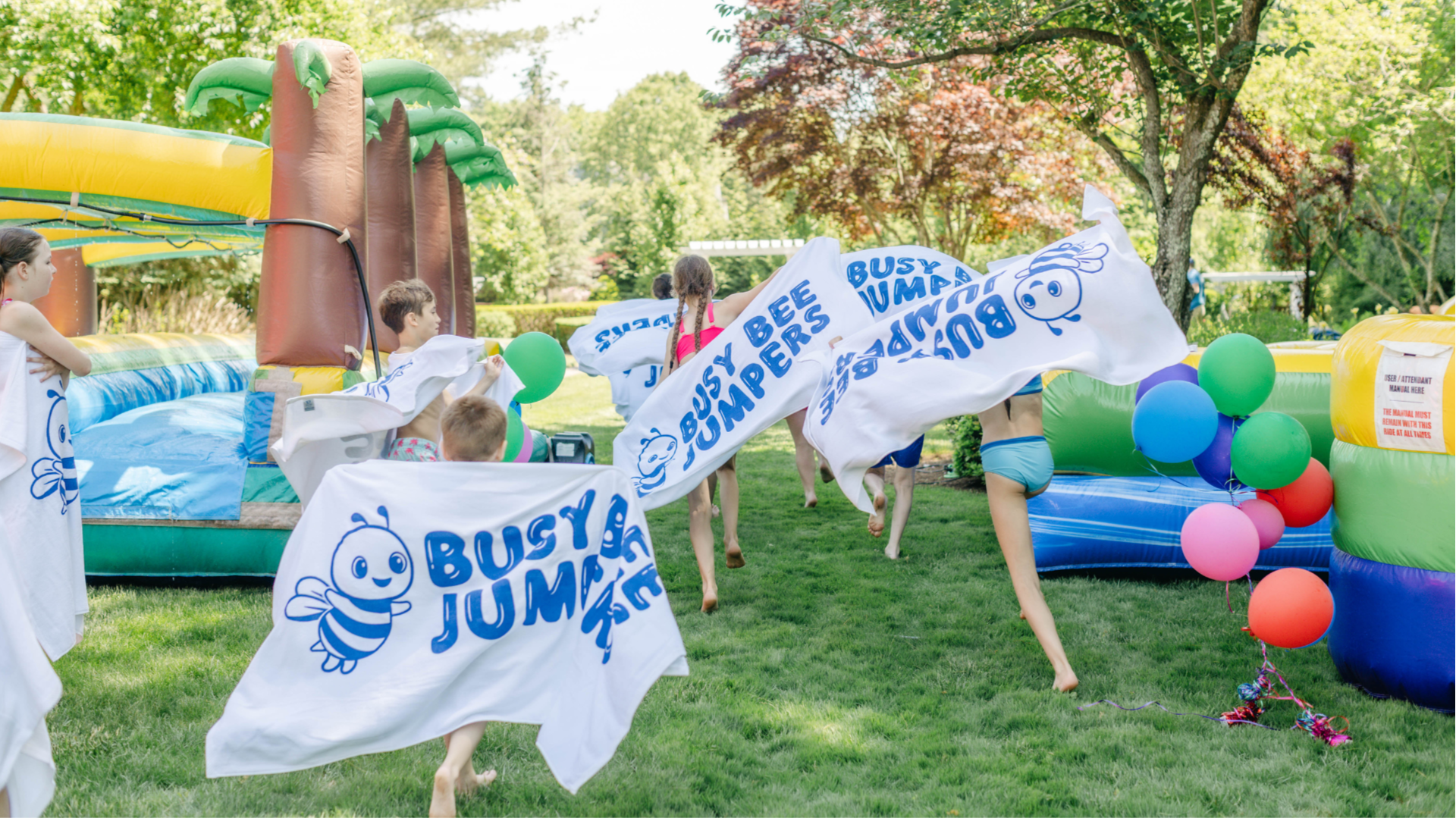 Photo of Busy Bee Jumpers inflatables setup