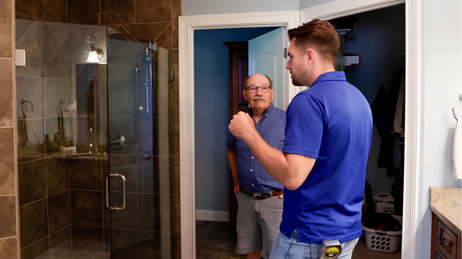 Photo of TruBlue Home Service Ally team member speaking with client