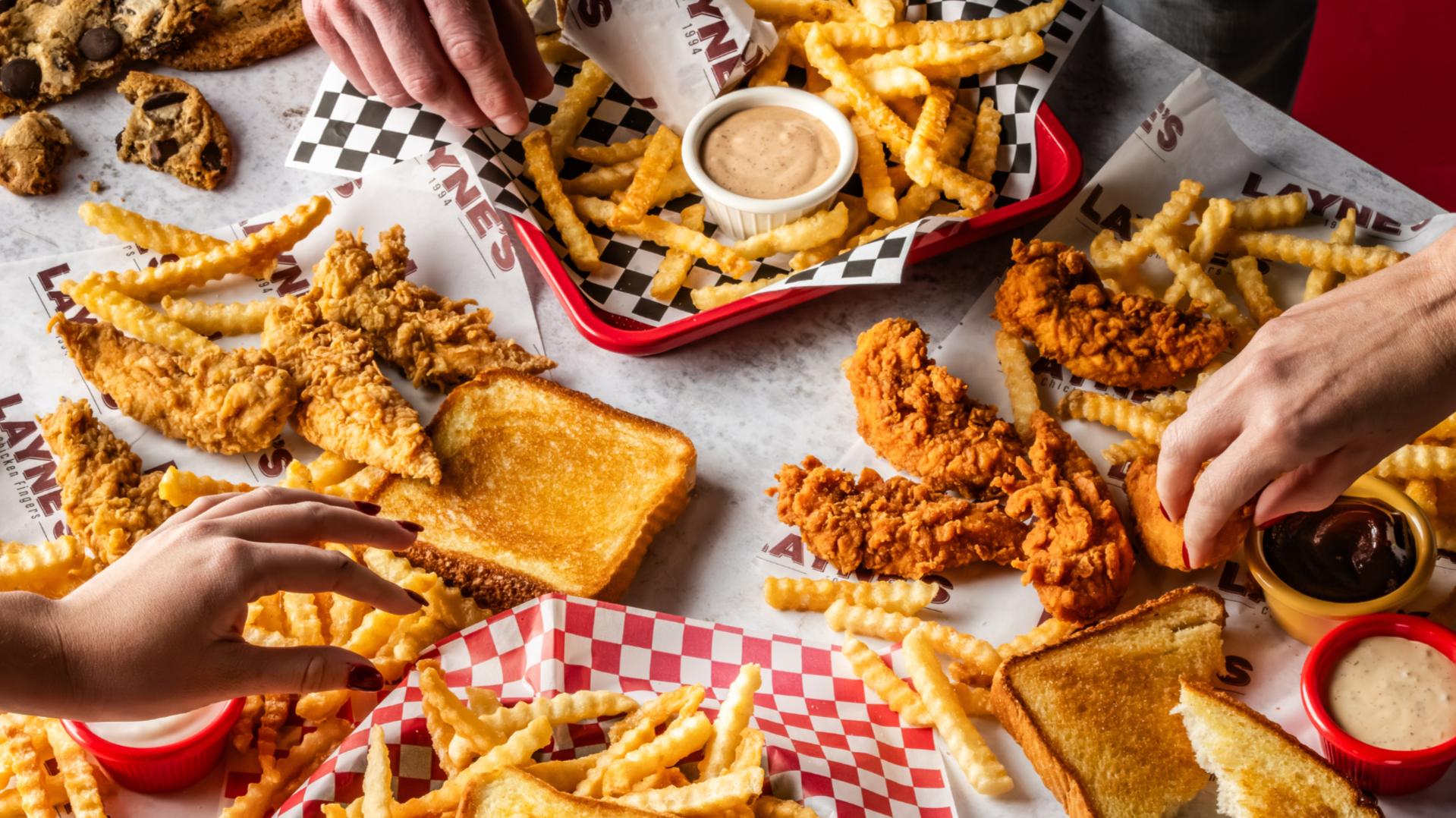 Photo of spread of Layne's Chicken Fingers meals