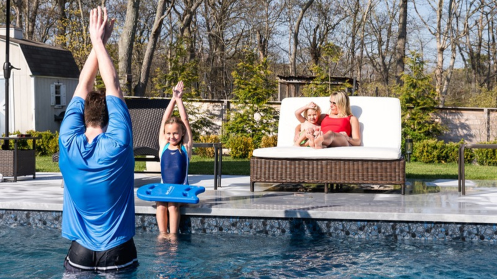 urSwim Franchsie - instructor teaching a child how to swim