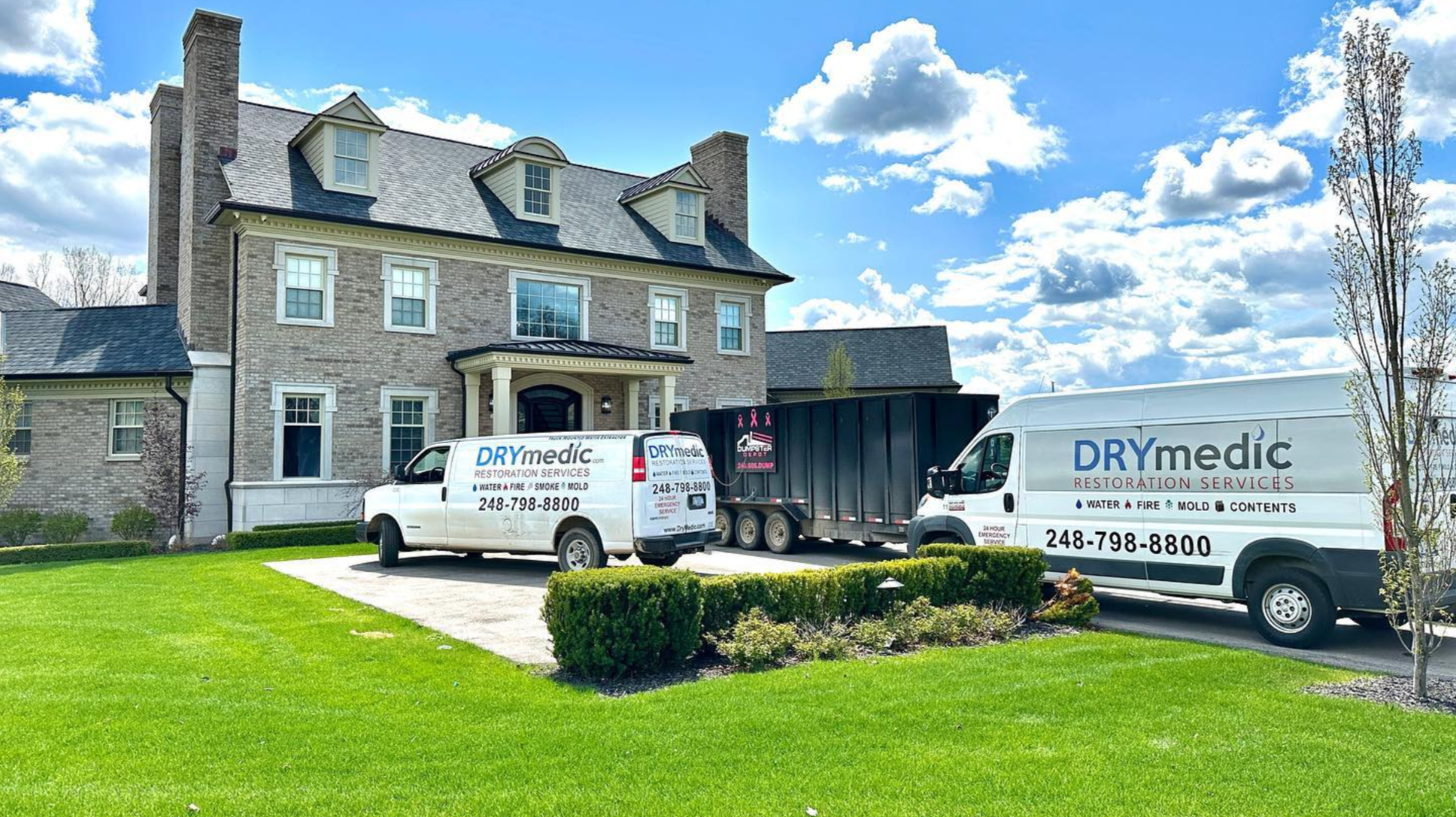 Photo of DRYmedic vans outside home