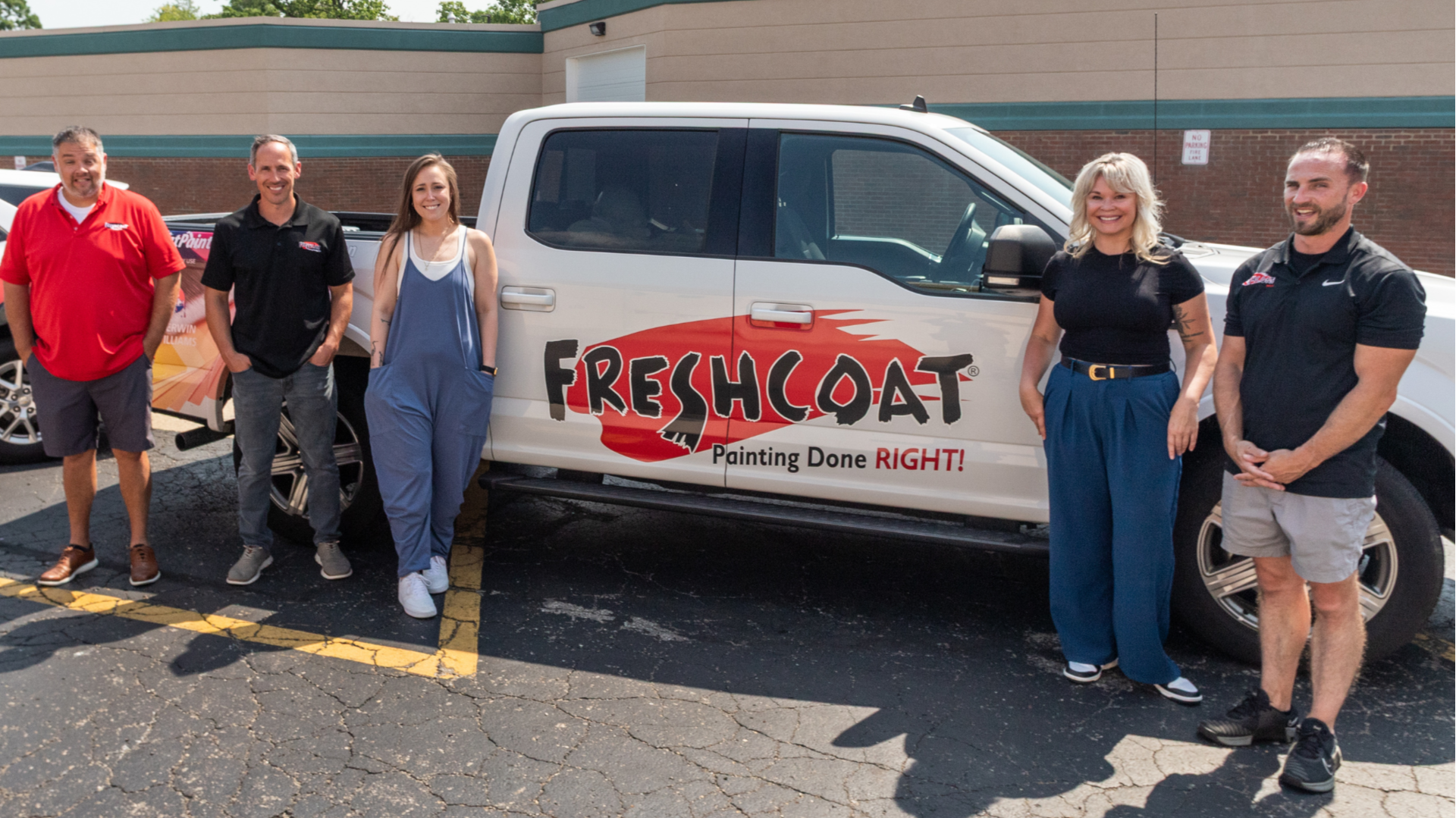 Photo of Fresh Coat Painters team and branded vehicle