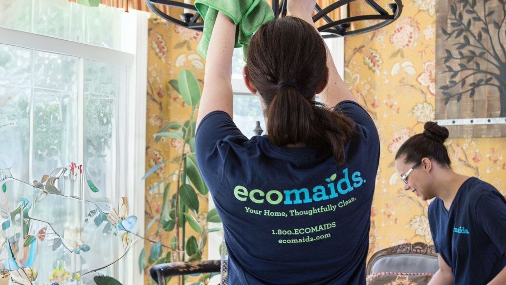 Photo of ecomaids team members cleaning a home