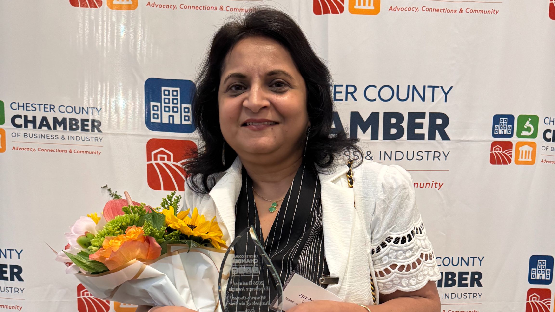Jyoti Arora accepts the award for Minority Business of the Year at the CCCBI Awards Dinner.